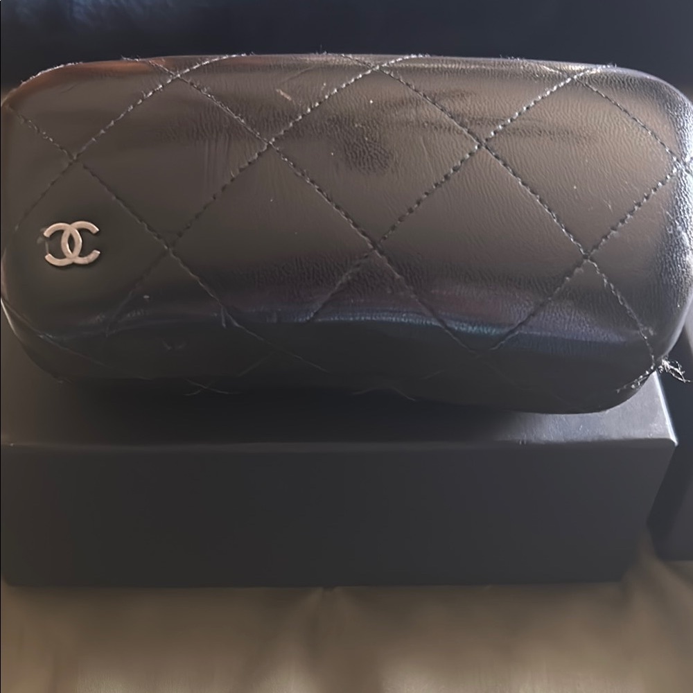 CHANEL Black and White Sunglasses with Iconic Quilted Design.  Polarized